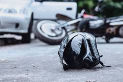 Black biker helmet on street