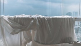 Cos’è il “trucco del lenzuolo” per far asciugare prima i vestiti