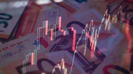 Mercati finanziari e rendimenti in rialzo con euro e grafici di Borsa